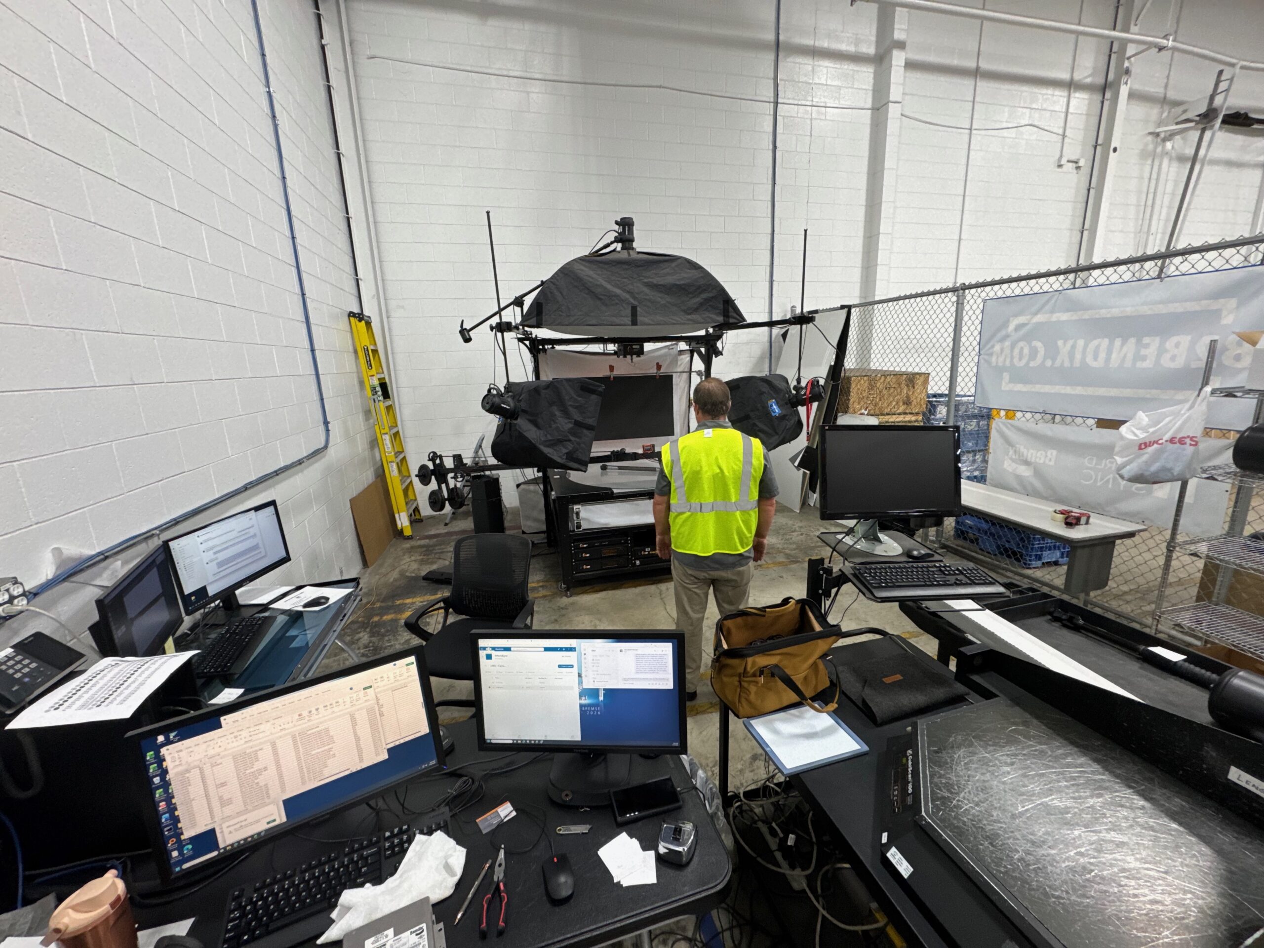 PhotoSpherix team operating an on-site 360 product photography system at Bendix